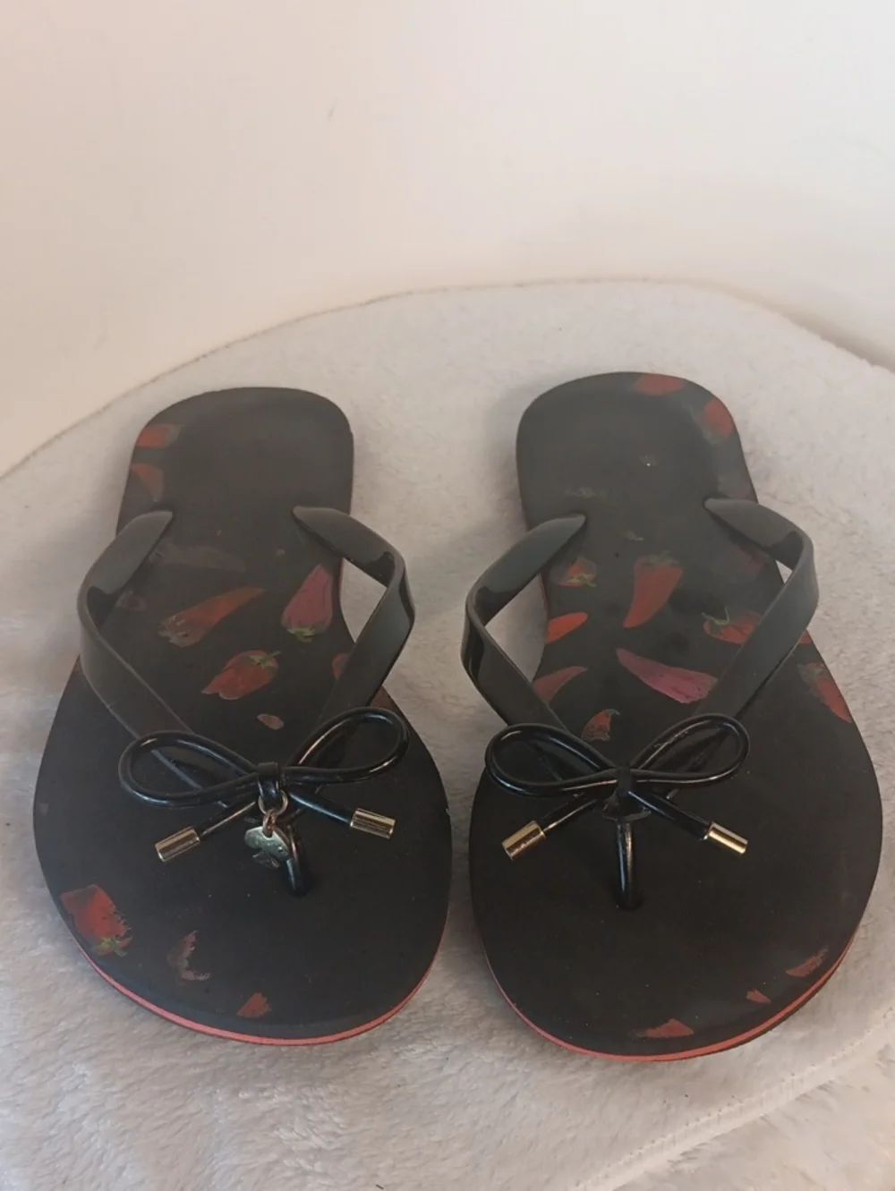 kate spade Black Flip Flop Sandals with Red Pepper Print and Bow